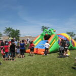 Caterpillar inflatable bouncer at outdoor event